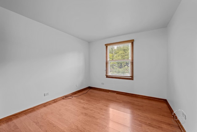 304 Dean Cir, Bolingbrook, IL 60440 - unfurnished room featuring wood finished floors