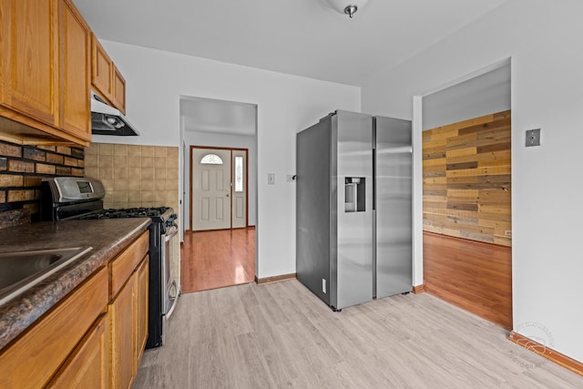 304 Dean Cir, Bolingbrook, IL 60440 - kitchen featuring stainless steel appliances, ventilation hood, dark countertops, light wood-style flooring, and tasteful backsplash