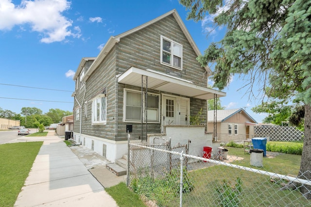 4501 S Kilpatrick Ave, Chicago, IL 60632 - view of front facade with a gate