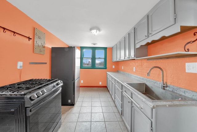 4501 S Kilpatrick Ave, Chicago, IL 60632 - kitchen with appliances with stainless steel finishes, a sink, decorative backsplash, baseboards, and light tile patterned floors