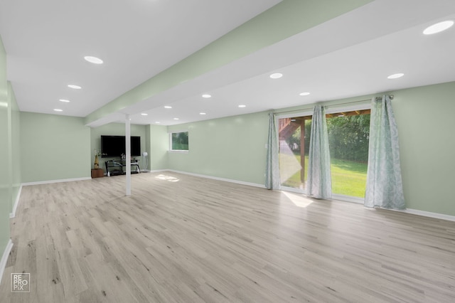 7623 Beringer Ct, Gurnee, IL 60031 - unfurnished living room with light wood-type flooring, plenty of natural light, and recessed lighting