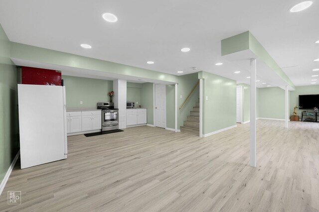 7623 Beringer Ct, Gurnee, IL 60031 - finished basement featuring freestanding refrigerator, light wood-style floors, stairway, and recessed lighting