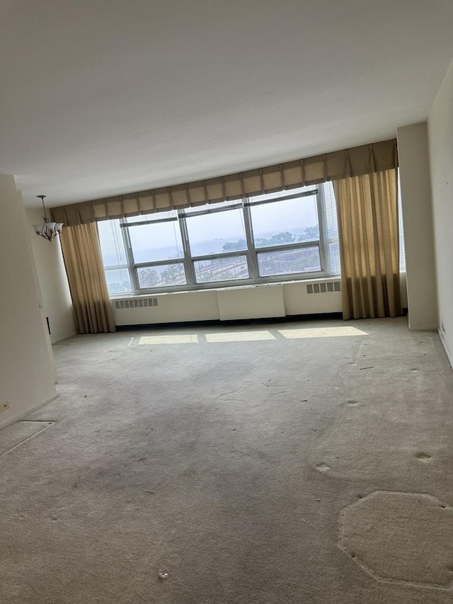 4800 S Chicago Beach Dr Unit 910S, Chicago, IL 60615 - empty room featuring carpet flooring