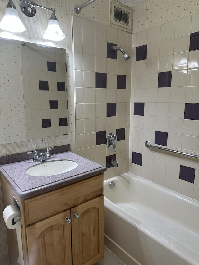 4800 S Chicago Beach Dr Unit 910S, Chicago, IL 60615 - bathroom with shower / washtub combination, vanity, and wallpapered walls