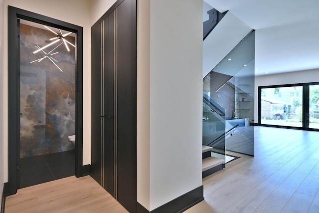 332 W Fremont Ave, Elmhurst, IL 60126 - hallway with wood finished floors and stairway