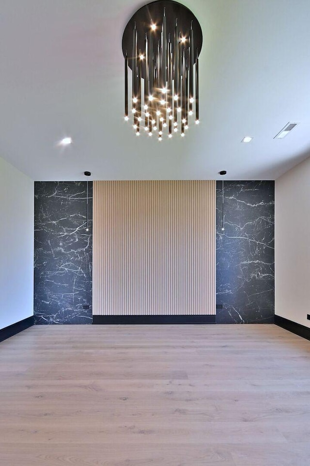 332 W Fremont Ave, Elmhurst, IL 60126 - spare room featuring an accent wall, wood finished floors, recessed lighting, and wallpapered walls