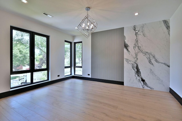332 W Fremont Ave, Elmhurst, IL 60126 - spare room with a chandelier, wood finished floors, and recessed lighting