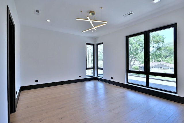 332 W Fremont Ave, Elmhurst, IL 60126 - spare room featuring healthy amount of natural light, light wood-style flooring, and recessed lighting