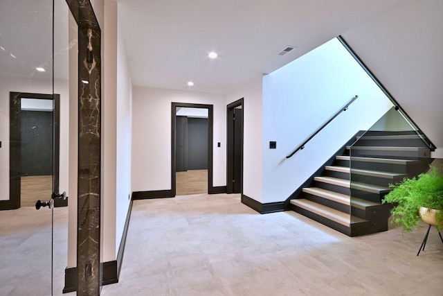 332 W Fremont Ave, Elmhurst, IL 60126 - entrance foyer featuring stairway, finished concrete flooring, recessed lighting, and elevator