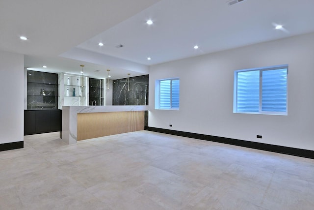332 W Fremont Ave, Elmhurst, IL 60126 - unfurnished living room featuring recessed lighting and baseboards