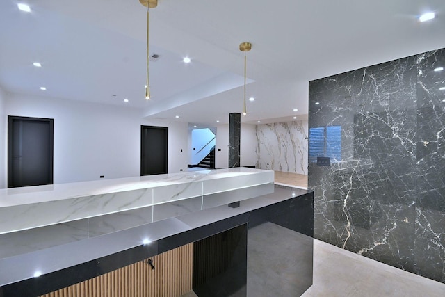 332 W Fremont Ave, Elmhurst, IL 60126 - bathroom with recessed lighting, a marble finish shower, and stone wall