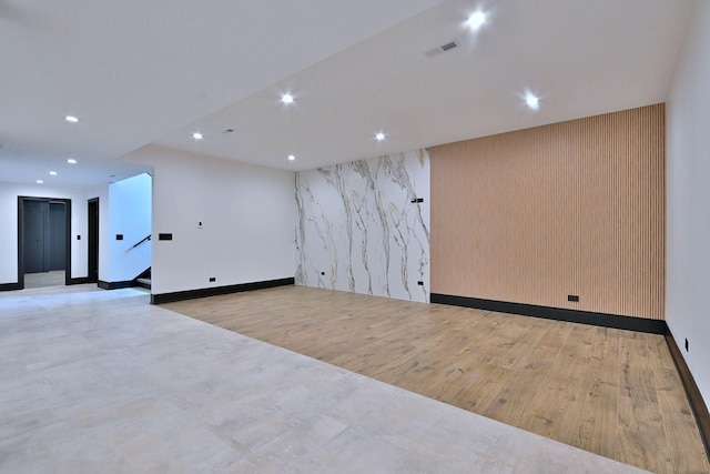 332 W Fremont Ave, Elmhurst, IL 60126 - spare room featuring recessed lighting, an accent wall, elevator, wood finished floors, and stairs