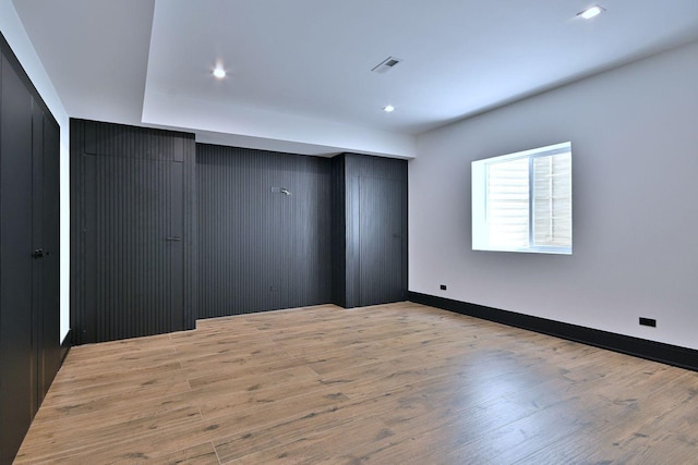 332 W Fremont Ave, Elmhurst, IL 60126 - unfurnished bedroom with wood finished floors, a closet, and recessed lighting