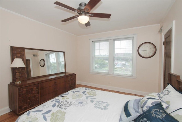 43 N Park Ave Unit 1A, Lombard, IL 60148 - bedroom with multiple windows, wood finished floors, ornamental molding, and ceiling fan