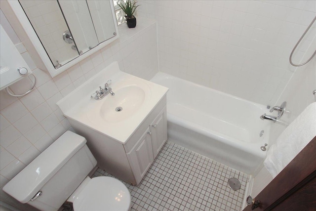 43 N Park Ave Unit 1A, Lombard, IL 60148 - bathroom with tile walls, vanity, tub / shower combination, and tile patterned floors