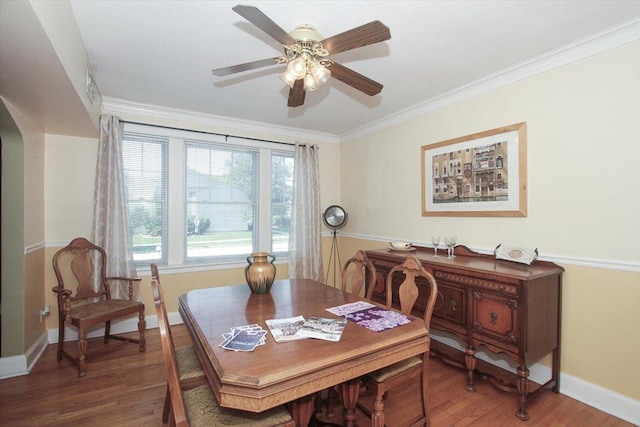 43 N Park Ave Unit 1A, Lombard, IL 60148 - dining area with arched walkways, a ceiling fan, ornamental molding, and wood finished floors