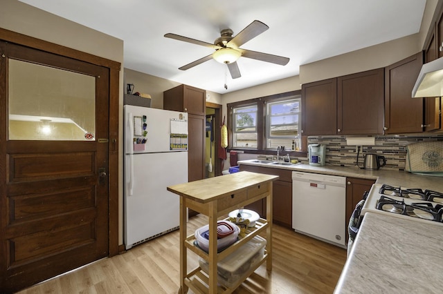 6513 Kane Ave, Hodgkins, IL 60525 - kitchen with white appliances, a sink, a ceiling fan, and light countertops