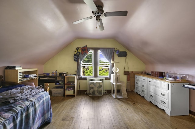 6513 Kane Ave, Hodgkins, IL 60525 - bedroom featuring radiator, hardwood / wood-style floors, lofted ceiling, and a ceiling fan
