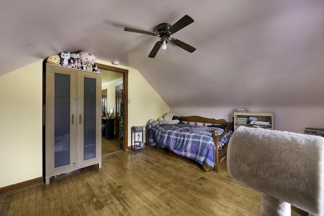 6513 Kane Ave, Hodgkins, IL 60525 - bedroom with wood-type flooring, vaulted ceiling, ceiling fan, and baseboards