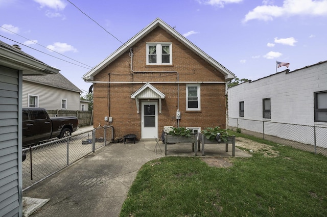 6513 Kane Ave, Hodgkins, IL 60525 - back of house featuring brick siding and a patio
