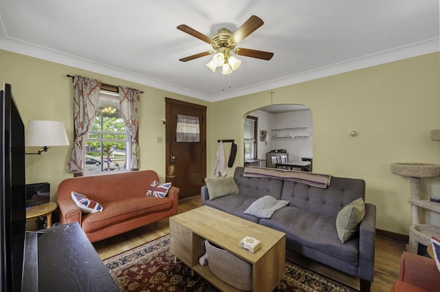 6513 Kane Ave, Hodgkins, IL 60525 - living area featuring wood finished floors, arched walkways, a ceiling fan, ornamental molding, and baseboards
