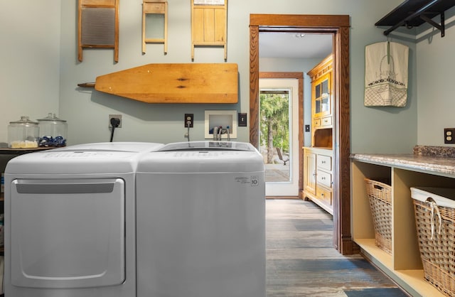 12002 Patterson Rd, Durand, IL 61024 - laundry area featuring independent washer and dryer and wood finished floors