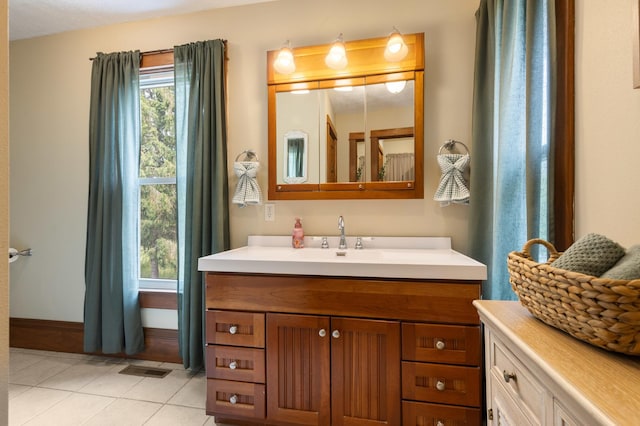 12002 Patterson Rd, Durand, IL 61024 - bathroom with vanity and tile patterned flooring