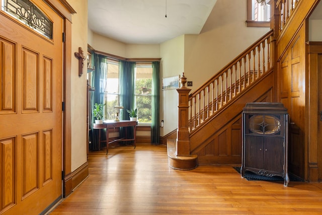 12002 Patterson Rd, Durand, IL 61024 - foyer with light wood finished floors and stairway