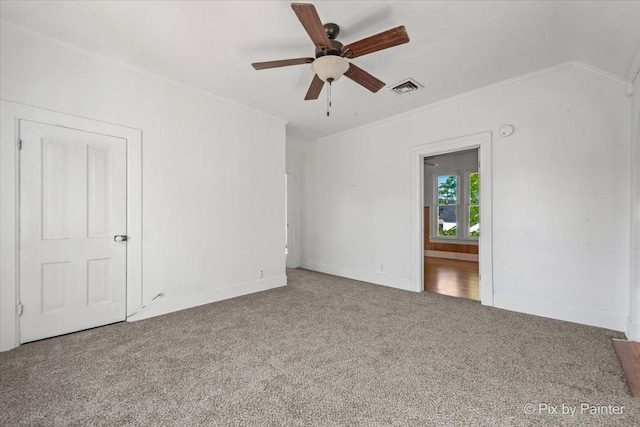 18 Madison St, Algonquin, IL 60102 - unfurnished room featuring carpet flooring, ornamental molding, and a ceiling fan