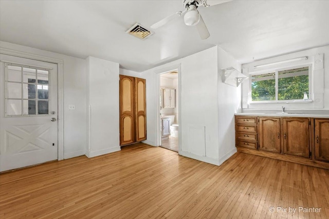 18 Madison St, Algonquin, IL 60102 - interior space with light wood-type flooring, connected bathroom, and ceiling fan