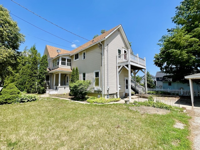 18 Madison St, Algonquin, IL 60102 - rear view of house with a balcony and a patio