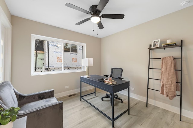 5901 W Erie St, Chicago, IL 60644 - office area featuring light wood-style flooring, a ceiling fan, and baseboards