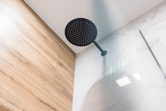 5901 W Erie St, Chicago, IL 60644 - bathroom view of a marble finish shower