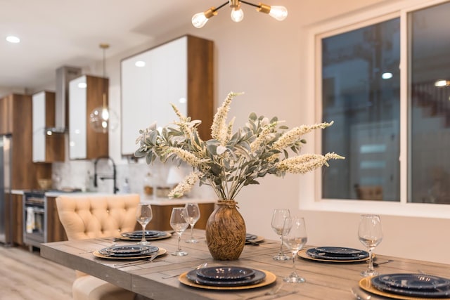5901 W Erie St, Chicago, IL 60644 - dining space featuring wood finished floors