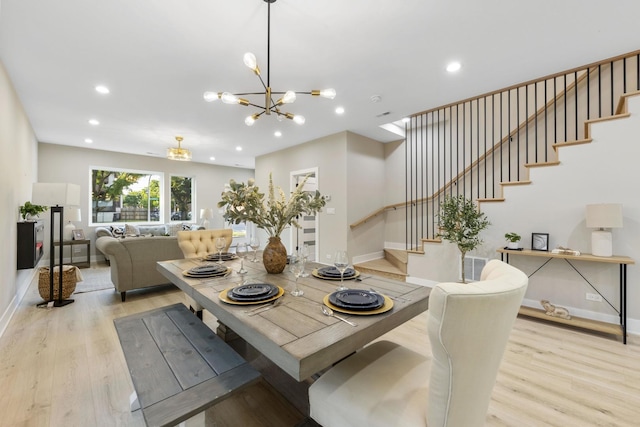 5901 W Erie St, Chicago, IL 60644 - dining room featuring stairs, light wood finished floors, baseboards, and recessed lighting