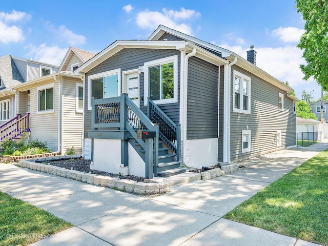1246 Marengo Ave, Forest Park, IL 60130 - view of front of house featuring a chimney and stairs