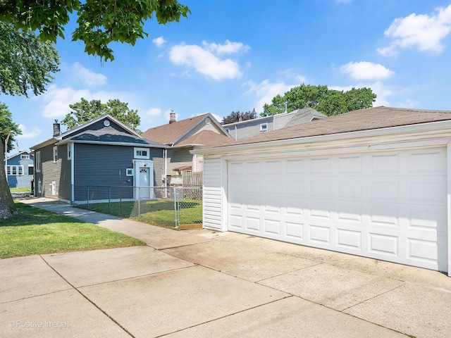 1246 Marengo Ave, Forest Park, IL 60130 - view of front of home with a chimney and a detached garage
