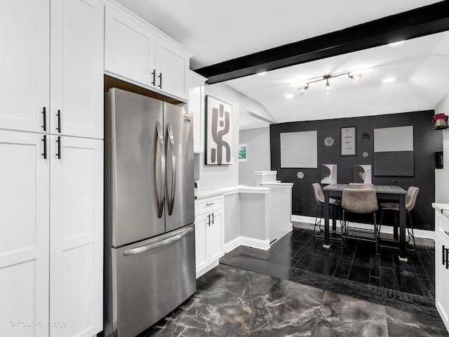 1246 Marengo Ave, Forest Park, IL 60130 - kitchen with freestanding refrigerator, white cabinets, light countertops, and dark marble finish flooring