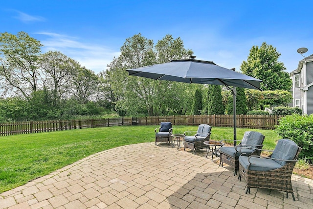 1S215 S Hyde Park, Geneva, IL 60134 - fenced backyard featuring a patio and view of wooded area