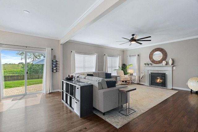 1S215 S Hyde Park, Geneva, IL 60134 - living area with dark wood-style flooring, ceiling fan, a brick fireplace, crown molding, and beam ceiling