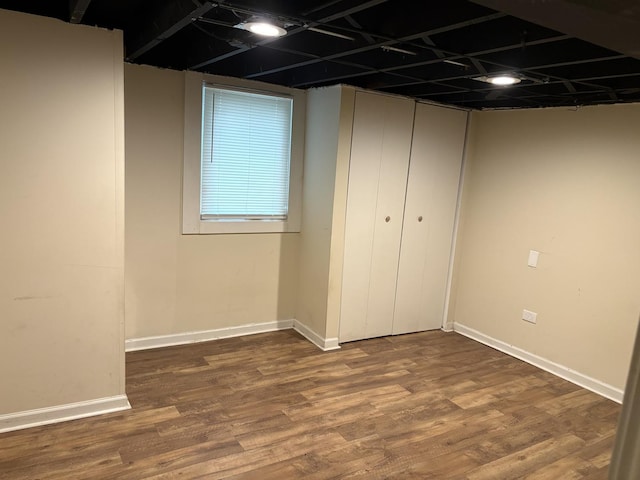 1101 N Ash St, Waukegan, IL 60085 - below grade area with wood finished floors and baseboards