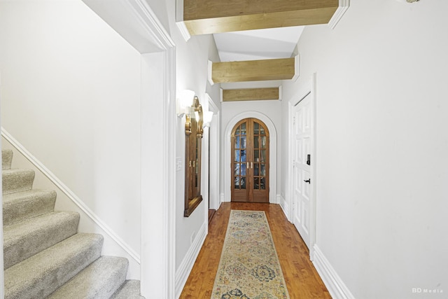 5213 Fairview Ave, Downers Grove, IL 60515 - hallway with wood finished floors, beam ceiling, stairway, and baseboards