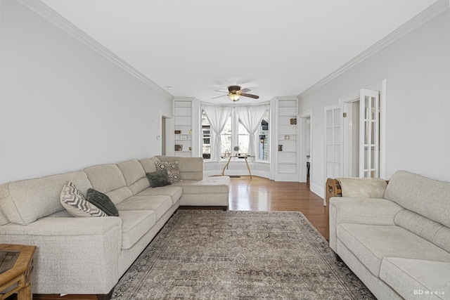 5213 Fairview Ave, Downers Grove, IL 60515 - living room featuring wood finished floors, crown molding, a ceiling fan, built in shelves, and baseboards