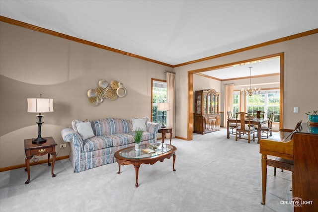 439 Camden Cir, Oswego, IL 60543 - carpeted living area with crown molding and a chandelier