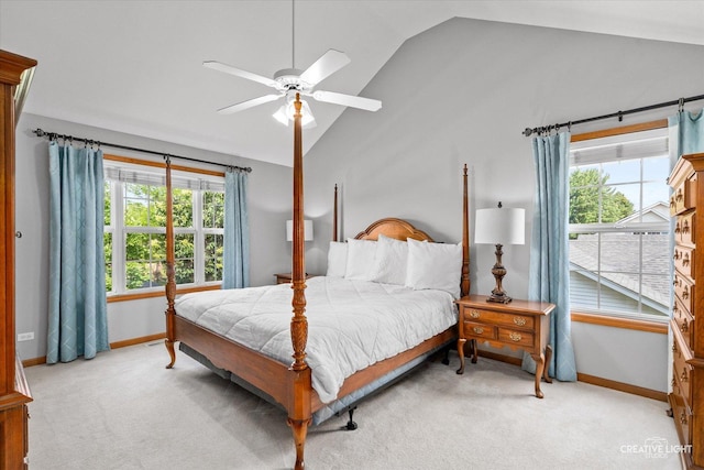 439 Camden Cir, Oswego, IL 60543 - bedroom featuring vaulted ceiling, carpet flooring, multiple windows, and ceiling fan