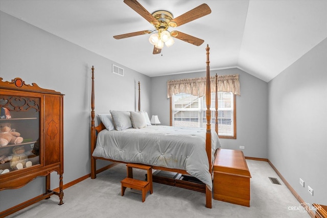439 Camden Cir, Oswego, IL 60543 - bedroom with light colored carpet, lofted ceiling, and a ceiling fan