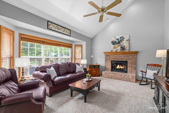 439 Camden Cir, Oswego, IL 60543 - carpeted living area with a brick fireplace, ceiling fan, and high vaulted ceiling