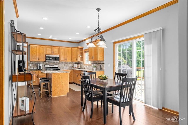 439 Camden Cir, Oswego, IL 60543 - dining space featuring ornamental molding, dark wood finished floors, and recessed lighting