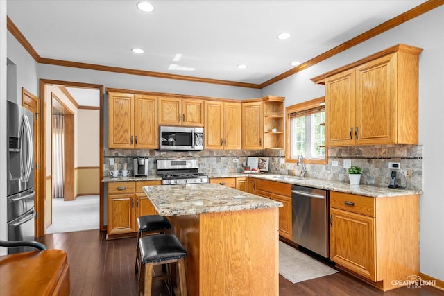 439 Camden Cir, Oswego, IL 60543 - kitchen with stainless steel appliances, open shelves, ornamental molding, light stone counters, and a kitchen island