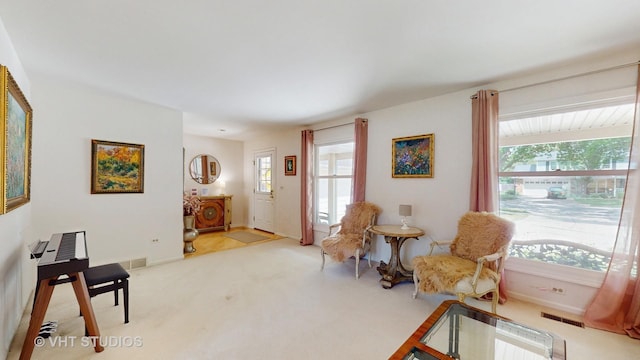 3026 N Stratford Rd, Arlington Heights, IL 60004 - living area featuring carpet flooring and healthy amount of natural light